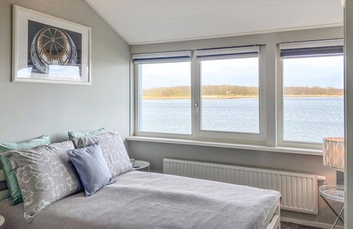 Municipality of Hollands Kroon House | This beautiful property right on the water and the harbor is an excellent starting point for water l