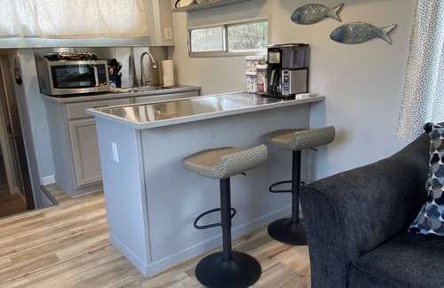 Elberton Boat Rental | This Boat Don't Float. Completely refinished and updated 50 foot Houseboat.