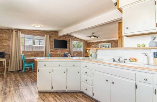 The Garden District House | This centrally located 1 bedroom features a full size pool and electric vehicle charging on site.