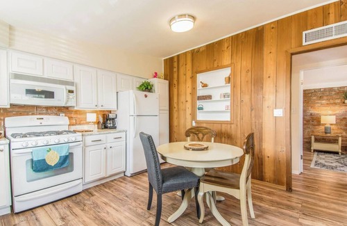 The Garden District House | This centrally located 1 bedroom features a full size pool and electric vehicle charging on site.