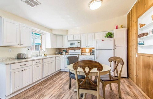 The Garden District House | This centrally located 1 bedroom features a full size pool and electric vehicle charging on site.