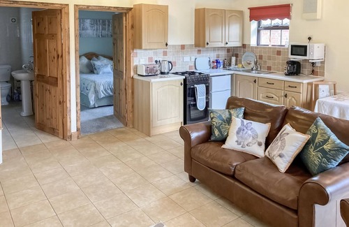 Poole Cottage | This charming detached cottages is the perfect getaway for a romantic trip.