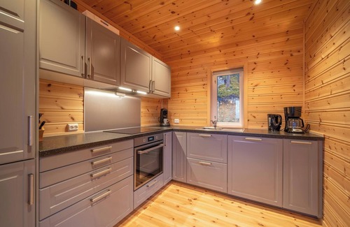 Vradal House | This charming Norwegian home with breathtaking views of fjords and Lake Nisser is suitable for 8 people.