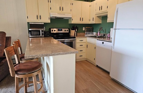 Dillon Condo | This cheery condo awaits your stay.