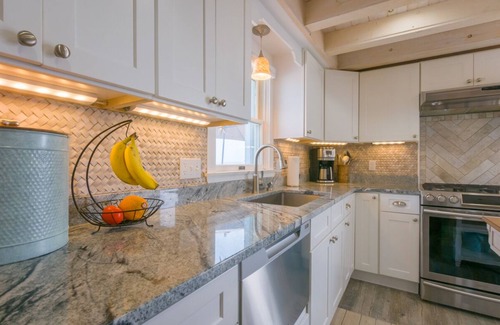 Sagamore Beach House | This enchanting cottage set atop the dunes of Sagamore Beach offers a vacation lifestyle you'll love