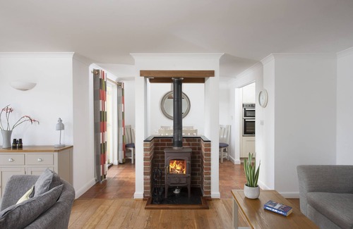 Truro House | This holiday home is situated right on the water’s edge within the Malpas Marina