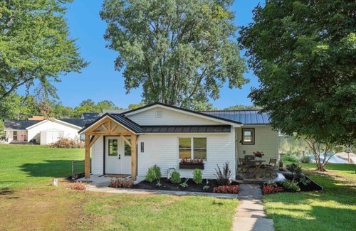 North Webster House | This house is located on North Webster Lake and features a hot tub.