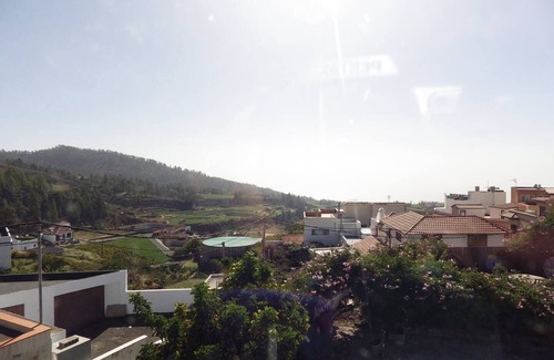 Vilaflor Apartment | This is a double room with a double bed. It has an en-suite bathroom. The window in the room looks out into the hallway.