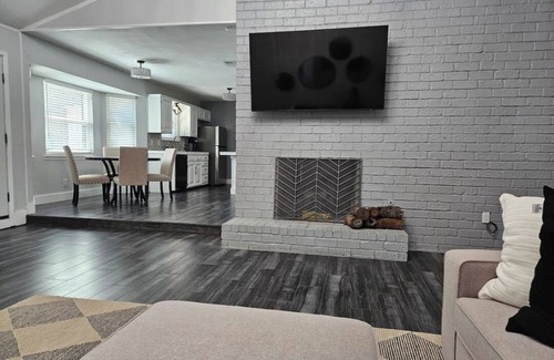 Odessa House | This modern 4-Bedroom features a spacious interior and exquisite backyard.