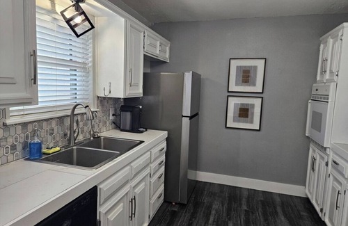 Odessa House | This modern 4-Bedroom features a spacious interior and exquisite backyard.