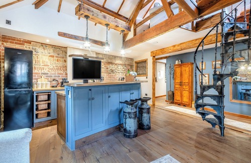 Ingham Cottage | This picture-perfect barn conversion, boasts a private hot tub and sauna.