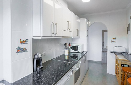 Orihuela Apartment | This pretty vacation apartment with a large terrace is located not far from the sea.