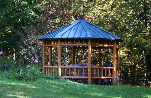 Ashford Cabin | This rare historic lodge at Mt. Rainier National Park has 4 bedrooms, Copper Creek frontage, a private hot tub on the creek, and is off the highway. Children welcome. Short walk to Copper Creek Restaurant.
