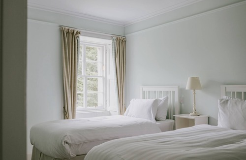Calvine Apartment | This recently renovated farmhouse features two spacious bedroomed apartments that can be joined to g