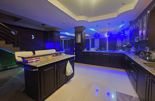 Claxton Bay House | This spacious property features a fully equipped kitchen, and an inviting small pool