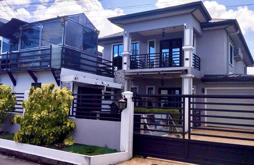 Claxton Bay House | This spacious property features a fully equipped kitchen, and an inviting small pool