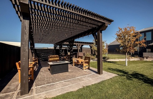 Amarillo House | This spacious retreat features 5 bedrooms, 2 futons, and 2 reclinable couches
