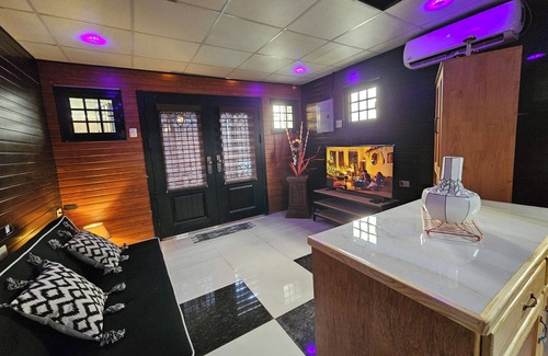 Claxton Bay Apartment | This spacious studio features a fully equipped kitchen, and an inviting small pool