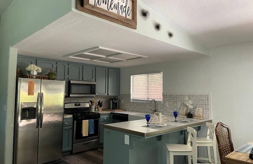 North Auburn House | This travel themed Room has a walk in closet, and Private bathroom