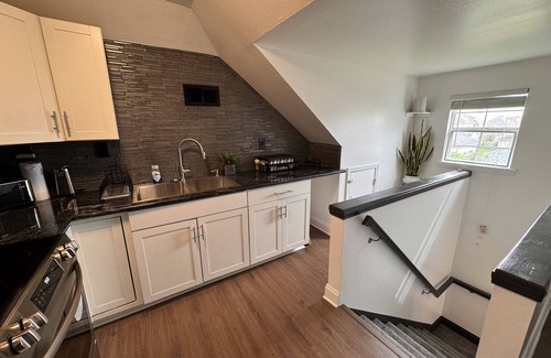 Algiers House | This two-story modern retreat guest house is the perfect spot to rest and relaxn
