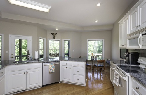Sunset House | This wooded retreat has everything! Spring & Summer right around the corner!