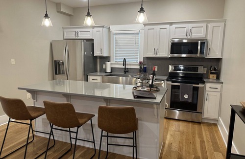 Manhattan Apartment | Thompson House #2-Overlooking City Park. Walk to Campus, Aggieville & Downtown