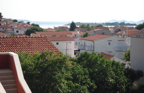 Tribunj Apartment | Three bedroom apartment with terrace and sea view Tribunj, Vodice (A-12529-a)