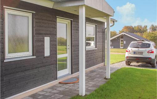 Arø House | Three-Bedroom Holiday Home Haderslev With A Fireplace 01