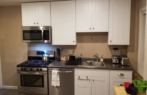 Manayunk House | Three bedroom two bath townhome with patio covered porch and decks