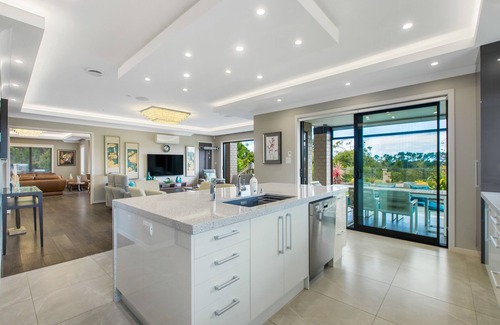 Auckland House | Three levels and home with covered swimming pool,tennis court,gym and games room