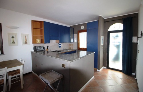 Porto Pollo Apartment | Three-room apartment with large sea view terrace, garden & barbecue.