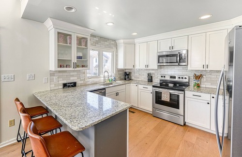 Mineral House | Three-story lakefront home w/covered boat slip, and tennis/pickleball access