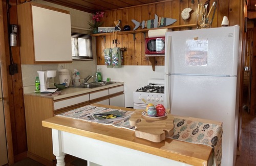 Oscoda Cabin | Three bedrooms with kitchen and a huge deck.