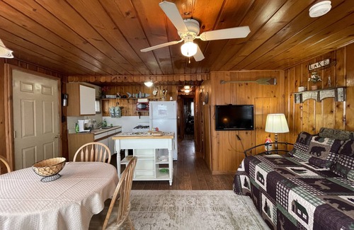 Oscoda Cabin | Three bedrooms with kitchen and a huge deck.