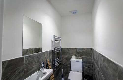 Farley House | Throwley, woodland lodge with hot tubs for 14