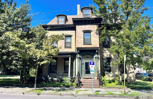 Newburgh Villa | Tiffany Suite: Enclosed Solarium Room + Bedroom + Office/Yoga Room