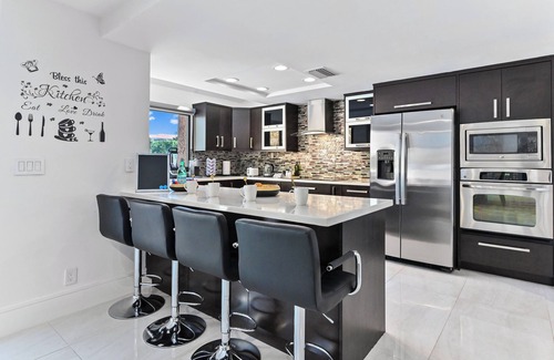 Boca Pointe House | Tiki Escape: Heated Pool & Luxe King Suite