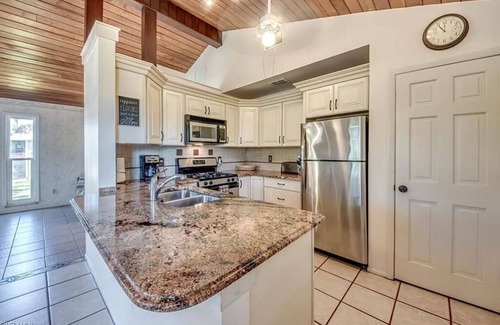 Alden Pines House | Tiki Garden Paradise Charming 4-bedroom Bokeelia House in the Sky on Island Time