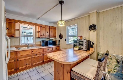 Alden Pines House | Tiki Garden Paradise Charming 4-bedroom Bokeelia House in the Sky on Island Time