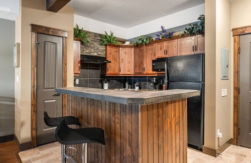 East Kootenay Apartment | Timber Mill | Outdoor Pool/Hot Tub | Ground Floor