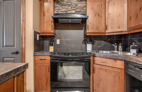East Kootenay Apartment | Timber Mill | Outdoor Pool/Hot Tub | Ground Floor