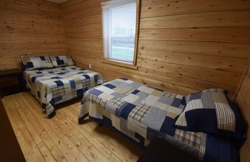 Tisdale Cabin | Timberland Lodges - Tamarac Lodge, lower suite