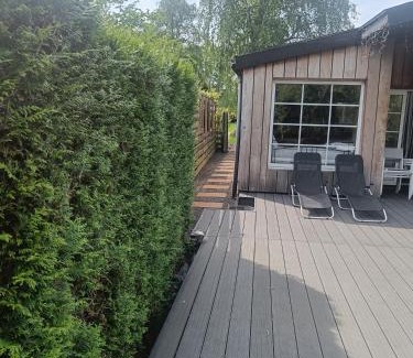 Geel Ski Chalet | Time 2 Relax chalet aan het water