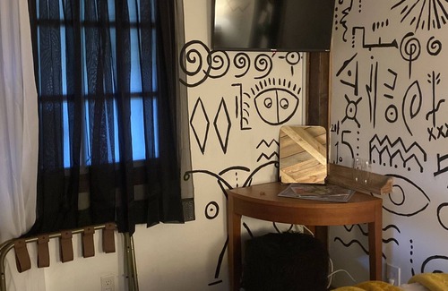 Athens Cottage | Tin Roof Rusted tiny house -2.5 miles to downtown, quite, secluded and private!