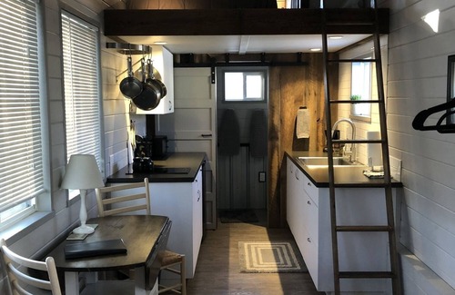Montrose House | Tiny home located beside a creek.