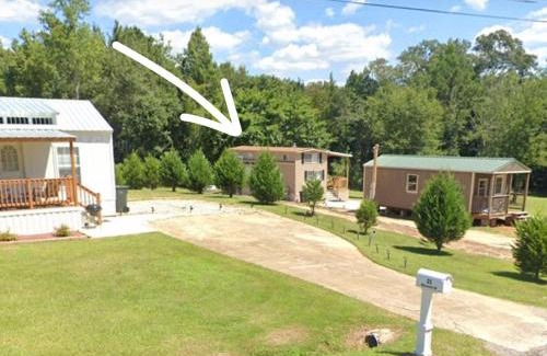 Phenix City Ski Chalet | Tiny home with hammock loft BBQ and yard