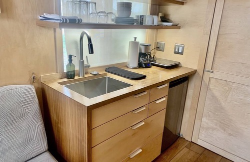 Montrose House | Tiny home with one lofted queen bed and full size futon.