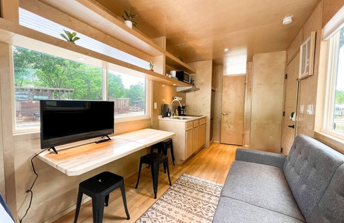 Montrose House | Tiny home with one lofted queen bed and full size futon.