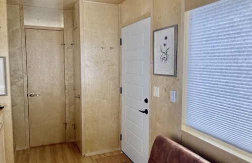 Montrose House | Tiny home with one queen bed and full size futon.