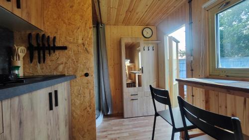 Kresice Apartment | Tiny House by the Wall
